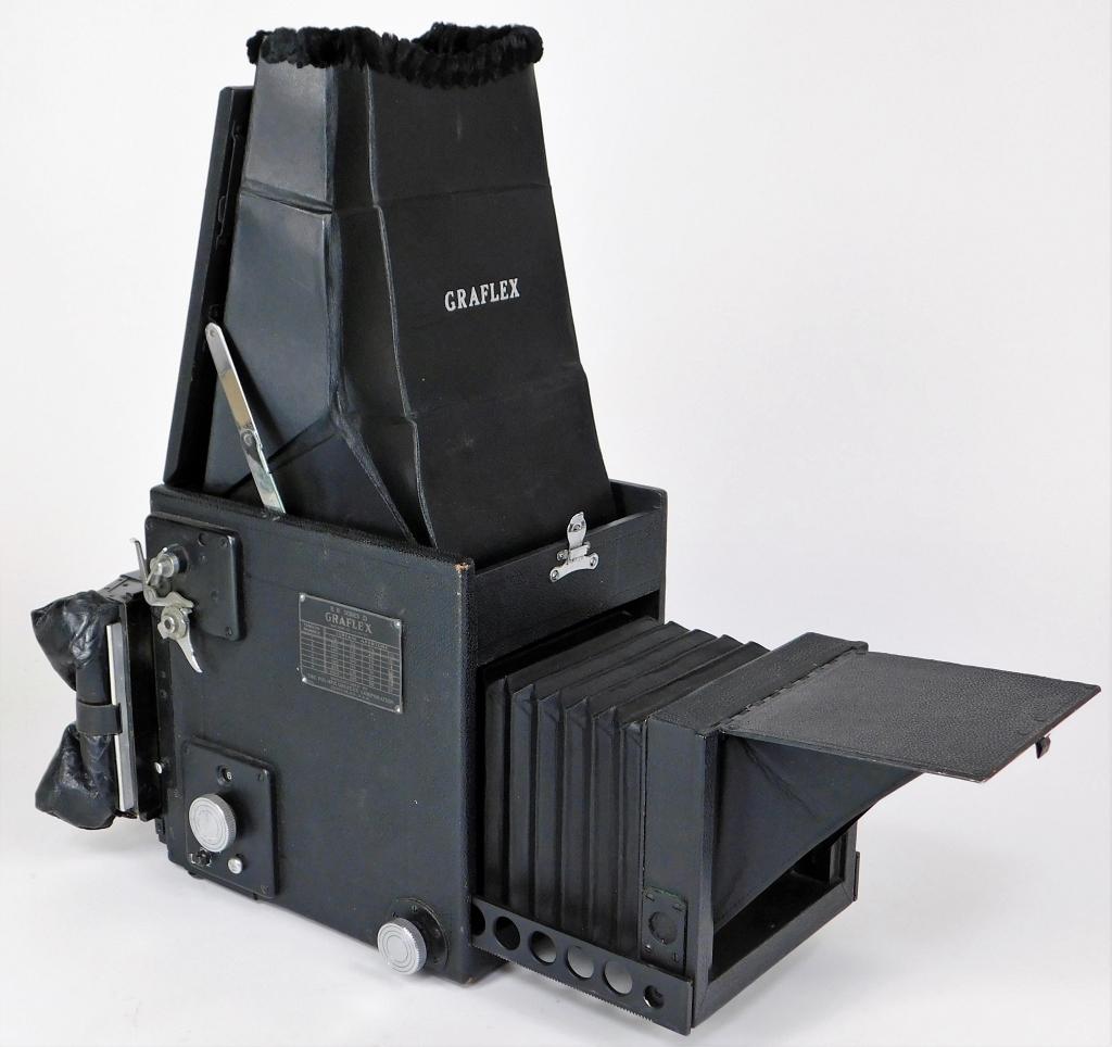Graflex Revolving Back Series D 5x7 Camera: Graflex Revolving Back Series D 5x7 camera, no lens, with Graflex bag magazine.