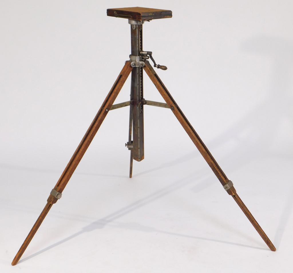 Folmer Graflex Compact Stand Tripod: Folmer Graflex Compact Stand wood and metal tripod. Approximately 39 inches tall.