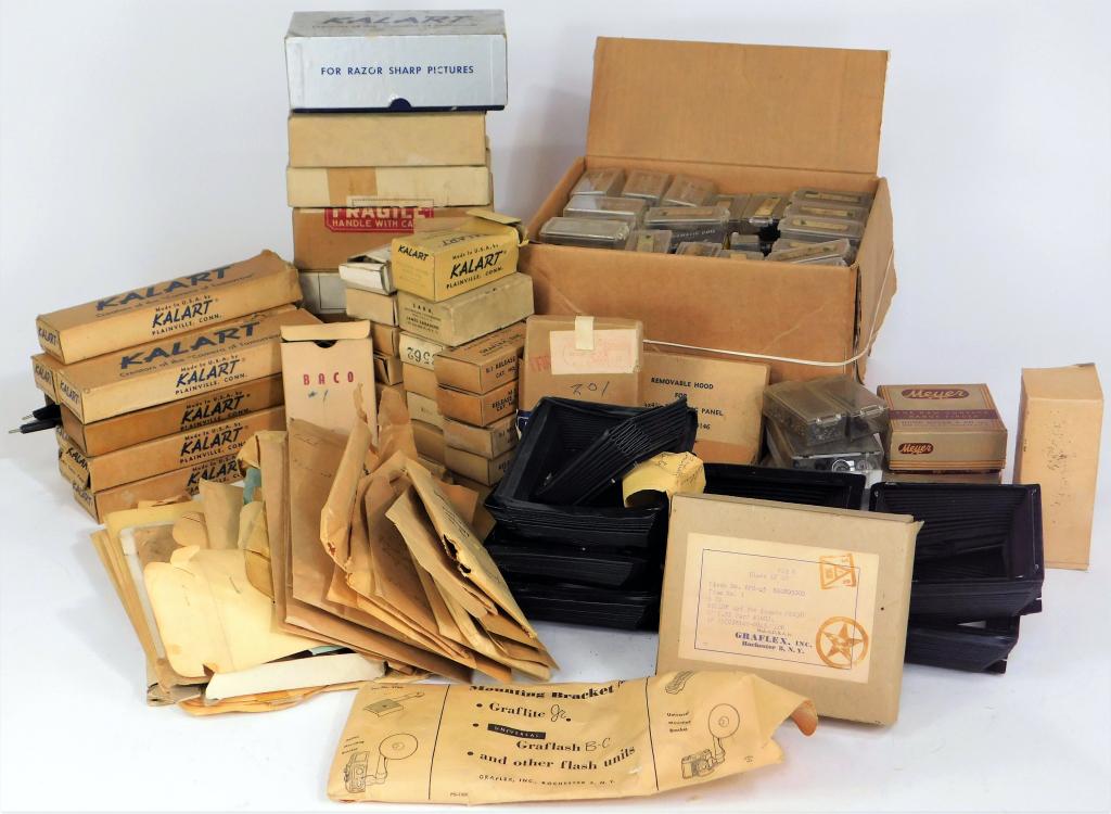 Large Lot of Graflex Camera Parts: Large lot of Graflex camera parts, including coils, hoods, bellows, brackets, mounting plates and much more!