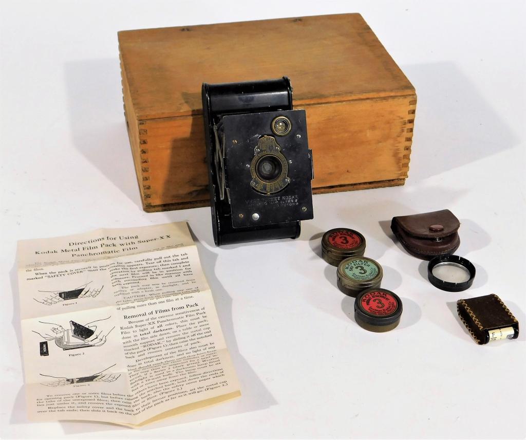 Kodak Vest Pocket Camera with Box & Filters.: Kodak Vest Pocket Model A Folding Roll film camera, for 127 roll film. Includes original wood box, manual, and filters, 1912-1914.