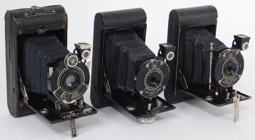 Lot of 3 Kodak Vest Pocket Cameras #1: Lot of 3 Kodak Vest Pocket folding cameras. Includes Vest Pocket Kodak Series III, Vest Pocket Kodak Model B, and Vest Pocket Autographic Kodak Model B cameras.