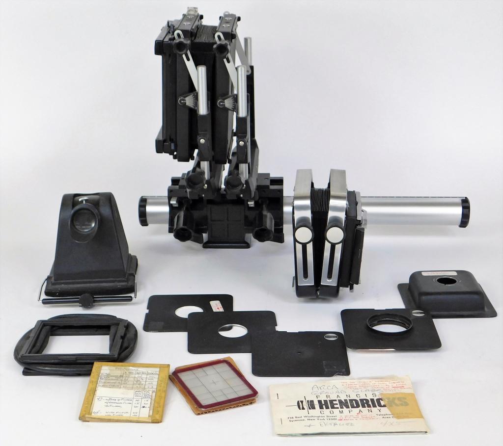 Two Monorail View Cameras, Omega and Arca Swiss: Two monorail view cameras. Omega 4x5 inch and Arca Swiss 2x3 inch (no rail). Has accessories and extra parts as shown.