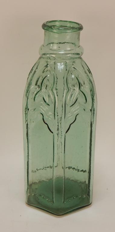 C.1870 American Gothic Cathedral Glass Pickle Jar: ,United States,1860-1880 Blow molded faceted form gothic cathedral pickle jar in aquamarine color, concave base. 13 1/4" x 5 1/2" base dia.,