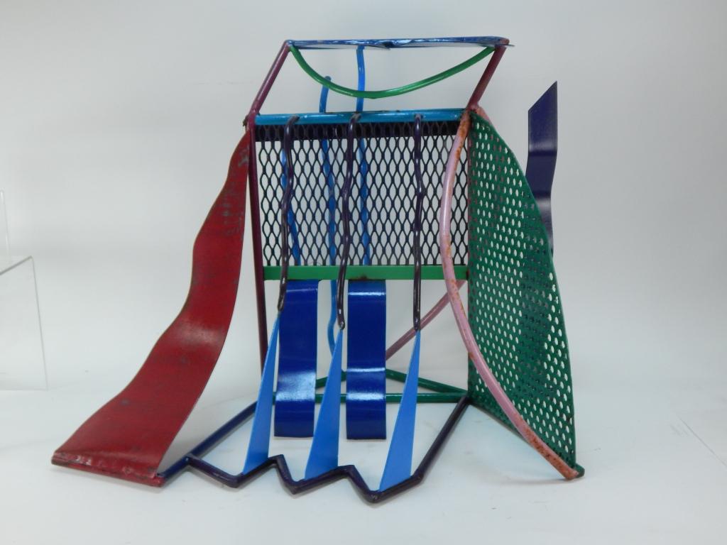 Italian Modern Memphis Group Style Metal Sculpture: ,Europe,20th Century Modernist assembled sculpture of shaped and punched metal in multiple colors. The sculpture exhibits influence from the work of Etorre Sottsass (1917-2007) and the Memphis Group. 