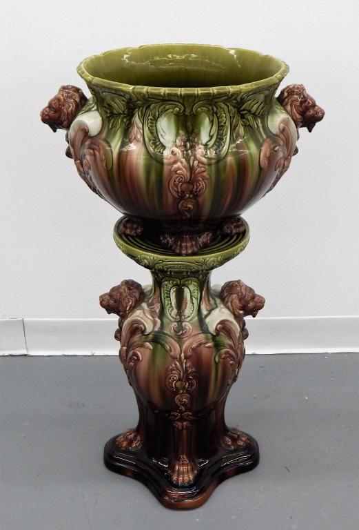 Antique Victorian Art Nouveau Jardiniere Pedestal: ,United States,C.1900 Multi colored glaze jardiniere with lion head lug handles on matching base. 33" tall,