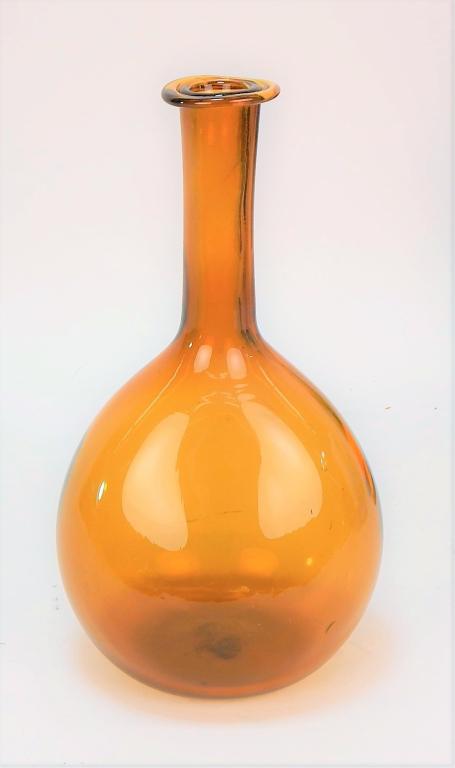Antique Black Cased Amber Art Glass Flask Vase: ,United States,Early 20th Century Interesting flask form with clear black internal casing with amber exterior and concave underside with broken pontil. 9" tall,