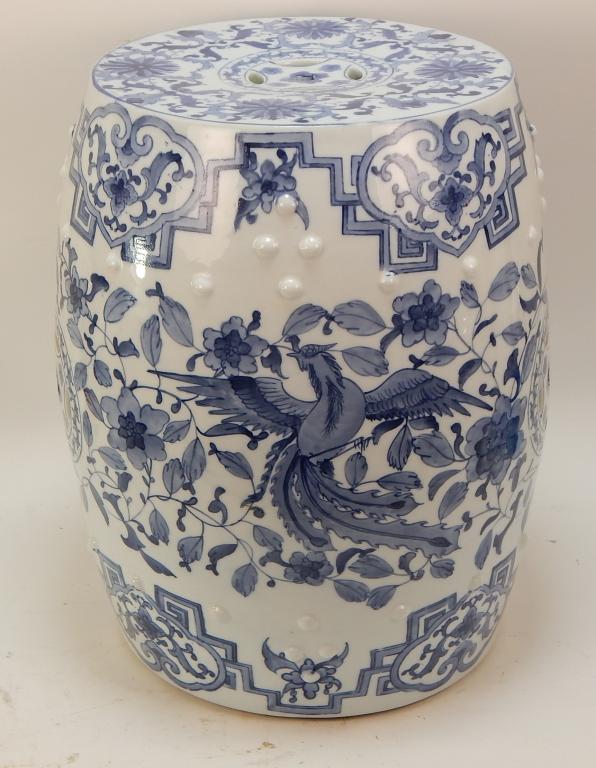 Chinese Blue & White Porcelain Floral Garden Seat: ,China,20th Century Decorated with a floral vine and phoenix bird pattern throughout. 17 3/8" x 11 1/4" dia.,