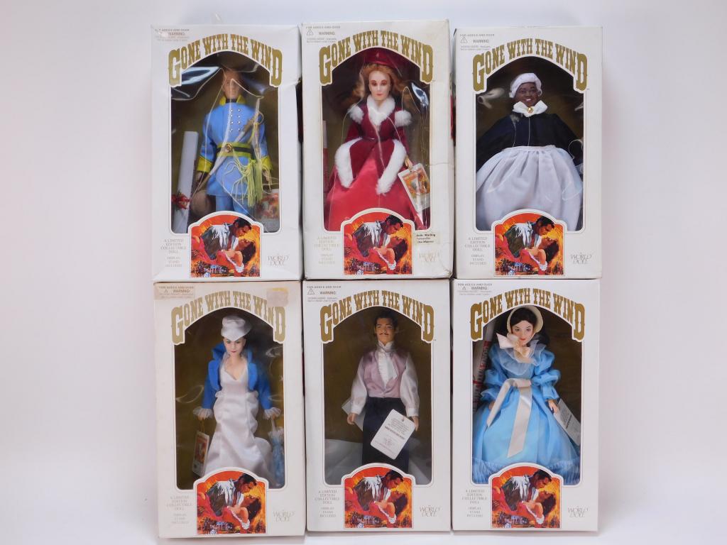 6 World Doll Gone With The Wind Assorted Dolls: China,Modern Includes Rhett 71244 loose in box, Mammy, Belle Whatling, Melanie, Scarlett 71166, and Ashley 71231 dolls with original clothes, accessories, and some paperwork. Vinyl,11" long