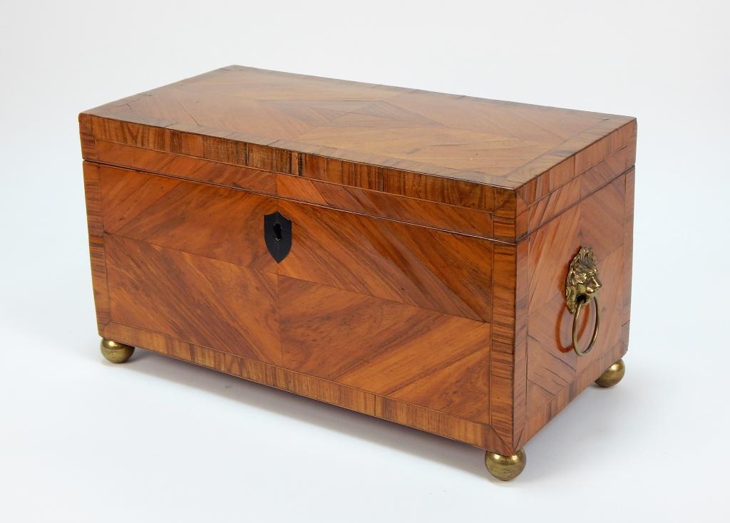 Antique English Georgian Parquetry Tea Caddy: ,England,Late 18th-19th Century Rectangular wooden box with simple diamond patterned lid opening to three compartments, decorated with brass ball feet and lion head handles. 6 3/4" t x 12" w x 6" d,,W