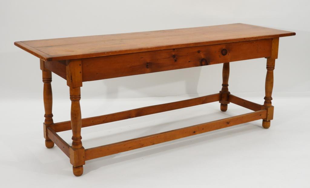 19C American Pine Primitive Folk Farm Table: ,United States,19th Century Two board top with bread board ends over a pegged apron with turned legs and stretcher base.77" long x 25" wide x 30" tall,,Pine