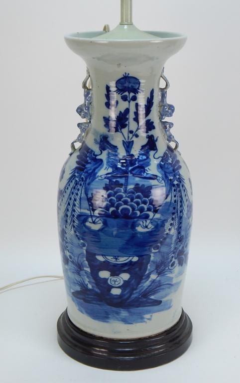 Antique Chinese Blue White Porcelain Vase Lamp: ,China,19th Century Baluster form with double animal form handle with deep rich blue decoration of opposing Phoenix birds. Vase 16 1/2" tall,Overall 32" tall.,Porcelain, wood, metal From the estate of