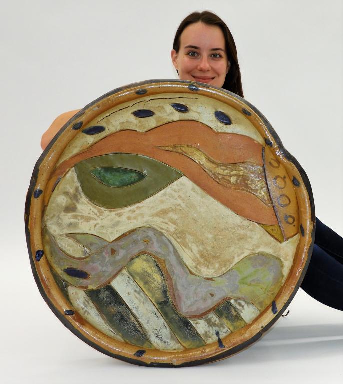 David Bogus Abstract Figure Ceramic Wall Charger: David Bogus,United States,Modern Abstracted animalistic figures carved and painted in center of charger with limited color palette, created in 2000 while Bogus was a resident at Peters Valley Craft Ce