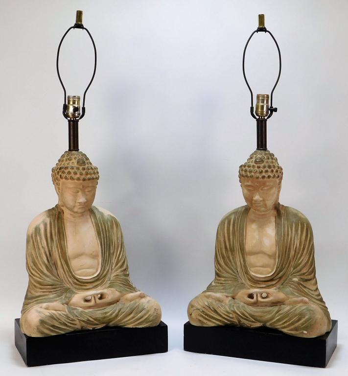 James Mont Hollywood Regency Buddha Lamps: ,United States,20th Century Figural pair of Buddha in a meditative state cast of thick plaster. Buddha figure 18",Overall 33" x 14" x 10",Plaster, wood, metal Unsigned From the estate of a Medfield, M