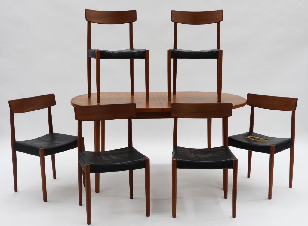 Troeds Bjarnum Danish Modern Teak Dining Set: ,Denmark,1960 Table and six chairs with original finish, chair with black leather seats.Table 5'1" x 3'3",Chairs 31"t x 18"w x 16"d,WoodTable and chairs are branded.From a Rhode Island estate.
