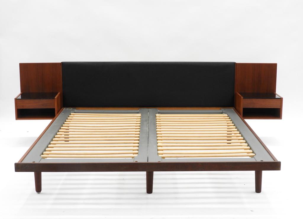Hans Wegner Getama Danish Modern King Size Bed: ,Denmark,C.1960 King size platform bed with leather covered headboard, two attached black glass top night stands flank each side.81"l x 99 1/2",Platform height 12",Wood