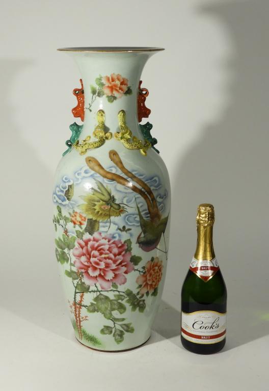 24" Chinese Republic Period Dragon & Phoenix Vase: ,China,20th Century Baluster form vase decorated with applied dragons and foo beast handles over image of a phoenix and dragon behind large roses with calligraphy and chop marks to the back. 23 5/8" x