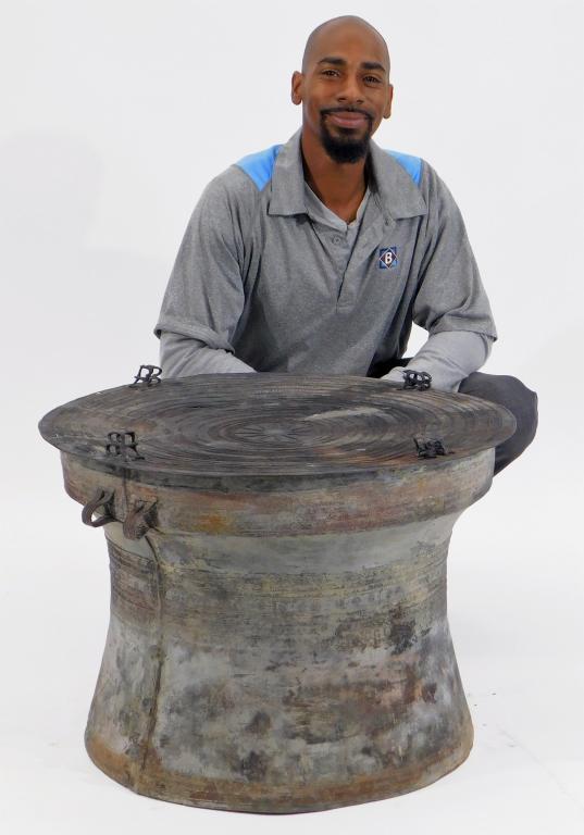 Burmese Dong Son Bronze Heger Type III Drum: ,Burma,18th-19th Century Double handled drum with geometric patterned top and frog figures around the edges. These drums were used to attract rain and appease spirits.19 3/4" t x 26 3/4" dia.,,BronzeF