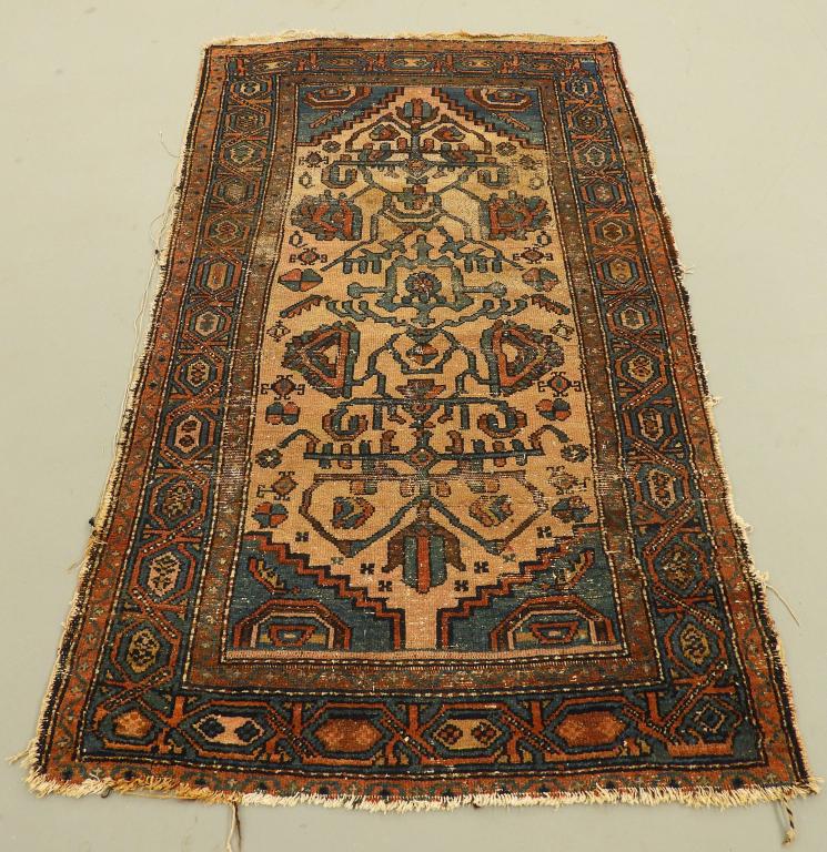 Antique Ivory Ground Middle Eastern Tribal Rug: ,Middle East,Early 20th Century Open ivory field with geometric styled tendrils surrounded by earthy blue border.5'8" x 3'4",,Wool, cotton