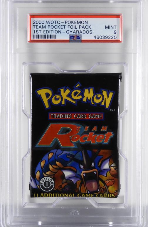 Pokemon Team Rocket 1st Ed. Gyarados Pack PSA 9: United States,2000 2000 Wizards of The Coast Pokemon Team Rocket 1st edition Gyarados trading card foil pack, PSA 9 MINT. Overall good condition.,PSA case 7" x 4 1/4"