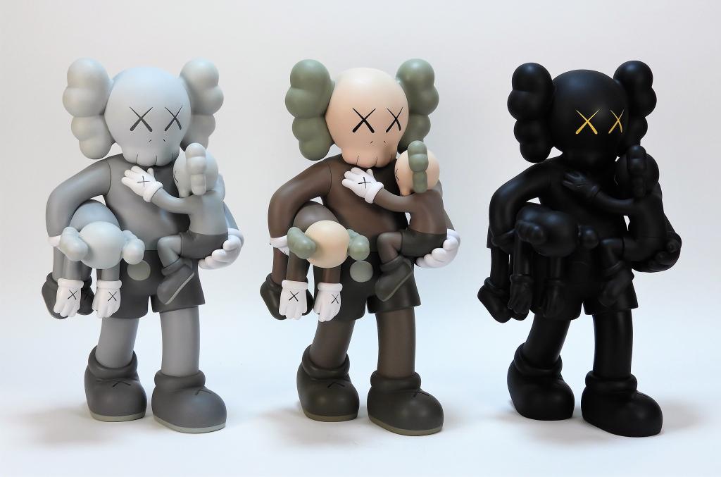 3 KAWS Clean Slate Companion Vinyl Sculpture Group: KAWS New Jersey, New York b.1974 Three works, Clean Slate (Black, Brown, Grey), 2018, cast vinyl, open edition. Each stamped on underside of feet. Each 14" x 8" x 8",Cast vinyl Purchased from KAWSONE.