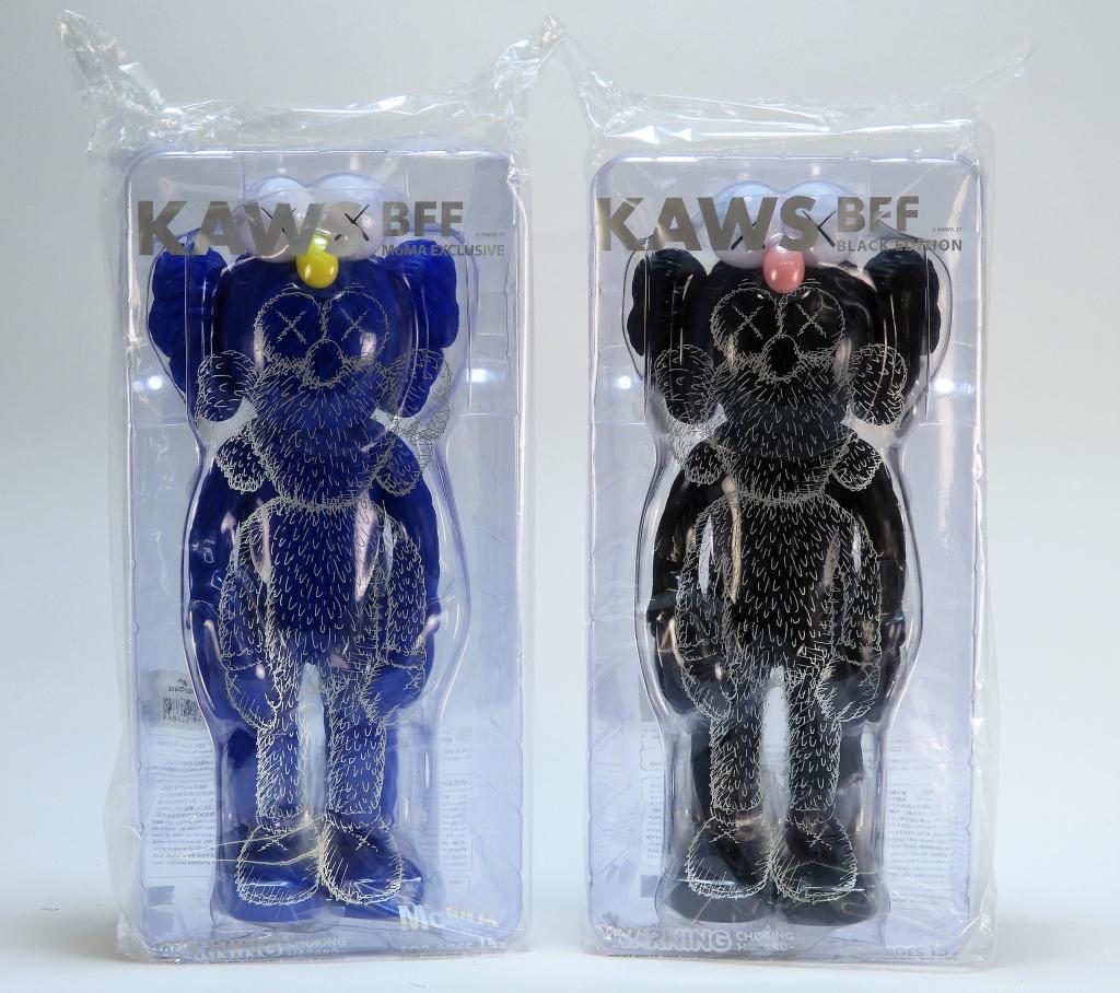 2 KAWS BFF Companion Sealed Vinyl Sculpture Group: KAWS New Jersey, New York b.1974 Two works, BFF Companion (Black, MoMa Blue), 2017, cast vinyl, open edition. Each stamped on underside of feet. Each 13 1/2" x 5" x 3 1/2",Cast vinyl Purchased from KA