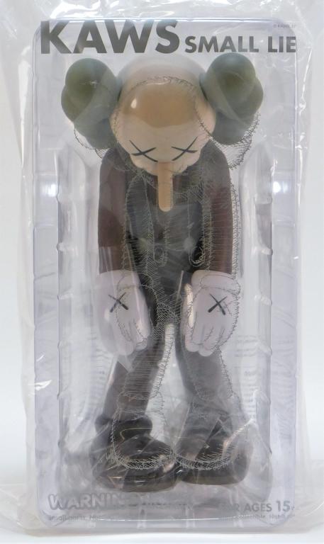 KAWS Small Lie Brown Sealed Cast Vinyl Sculpture: KAWS New Jersey, New York b.1974 Small Lie (Brown), 2017, cast vinyl, limited edition. Stamped on underside of feet. 10 3/4" x 5" x 5",Cast vinyl Purchased from KAWSONE. From a private Rhode Island co