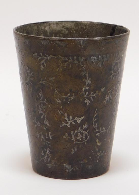 19C Persian Bronze Silver Inlaid Botanical Cup: Persia 19th Century Simple cylindrical cup decorated with inlaid silver tendrils and flowers partially retaining silver to stipples and incised designs. 4 1/4" x 3 1/2" dia.,,Bronze ,From the collecti