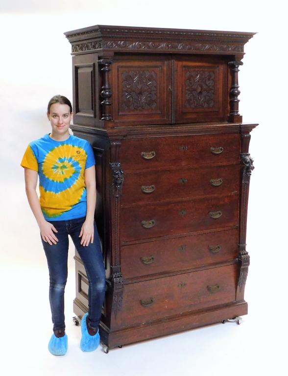 HUGE 19C Anton Krasinski New England Oak Dresser: Massachusetts 19th Century Ornate rectangular top over two doors with scrolling design opening to two shelves over five drawers flanked by two lion carvings and scrollwork. This case piece was made by