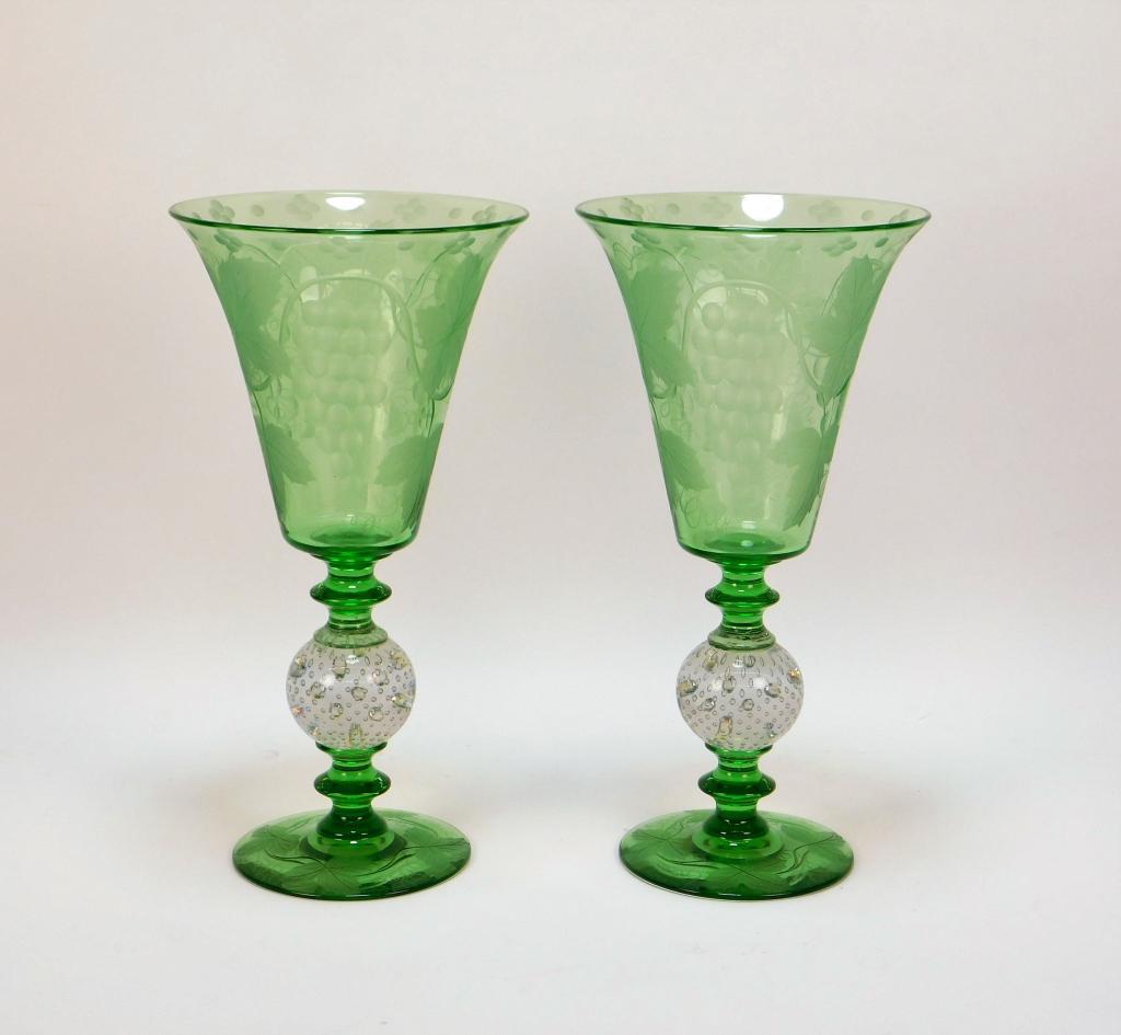 PR Pairpoint Etched Green Art Glass Vases: Massachusetts 20th Century Flared footed vases decorated with etched grapes and vines over controlled bubble clear glass ball supported by grape leaf etched foot. 12" x 6 1/8" dia.,,Glass ,From the co