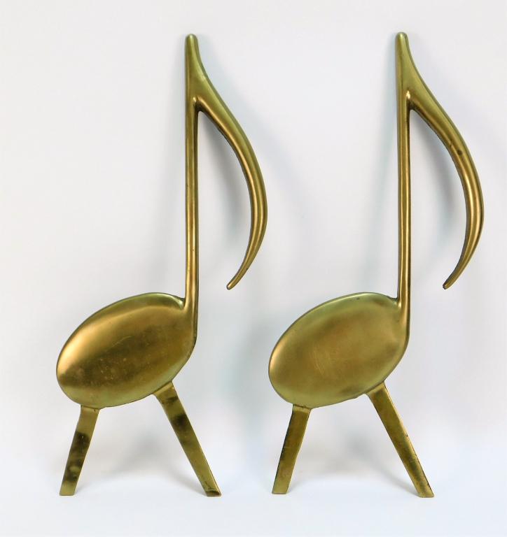 PR Tenn Chrome Plate Co. Brass Eight Note Andirons: Tennessee 20th Century Mid Century Modern polished brass eighth notes supported by simple legs. 17 1/4" x 7 3/4",,Brass Both marked "Tenn Chrome Plate Co. Nashville" on back.,From the collection of a 