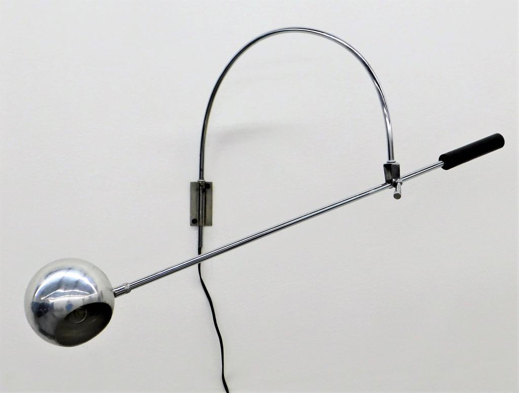 Robert Sonneman MCM Orbiter Wall Mounted Lamp: Robert Sonneman New York 20th Century Counter balanced chrome eyeball lamp supported by thin arched column. Full height 33 1/4",Full length 39",Metal ,From the collection of a Providence, Rhode Island
