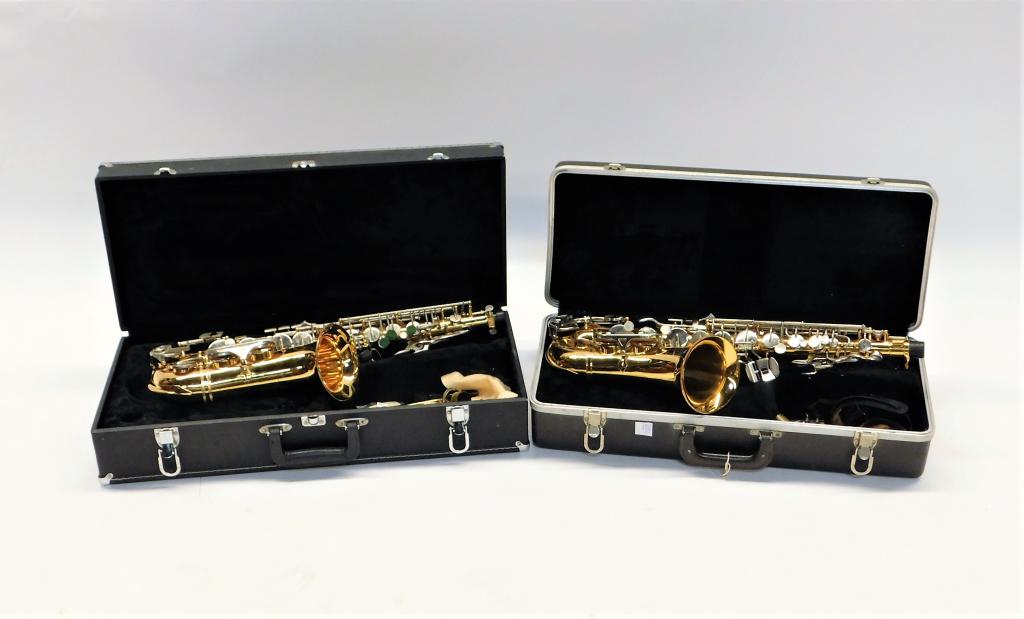2 Selmer Bundy & Jupiter Alto Saxophone Group: United States, Taiwan 20th Century Includes a Bundy II Saxophone and a Jupiter Saxophone with accessories, each with case included. Saxophone approx. 27" long,Case 11 1/2" t x 25 1/2" w x 6 1/4" d,Bra