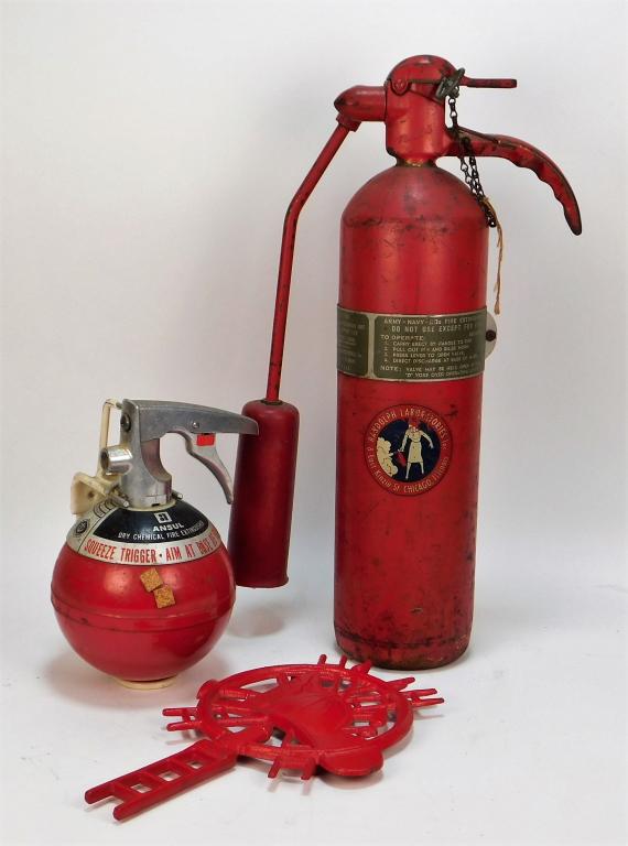 3PC Military Fire Extinguishers and Trivet Group: United States 20th Century Includes one small ball shaped ANSUL marine fire extinguisher, one Randolph Laboratories Inc. Army Navy fire extinguisher, and a firefighter helmet shaped trivet. Smallest 9