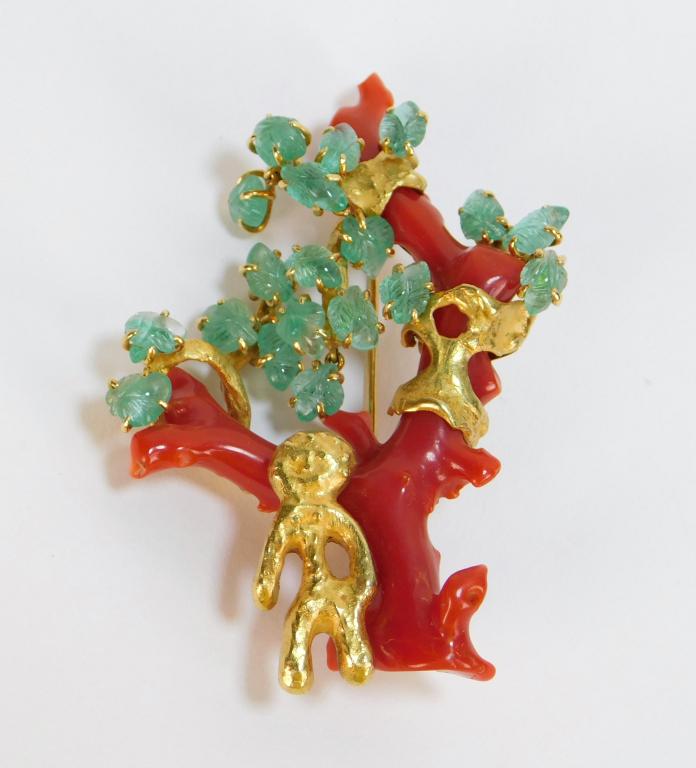 Franco Cannilla Masenza Roma 18K Gold Coral Brooch: Franco Cannilla Italy 1911-1985 Coral figural tree brooch with selected light green emerald leaves and figural person towards the base, mounted on an 18K gold frame. Weight as seen 39.7 grams. 3" x 2 