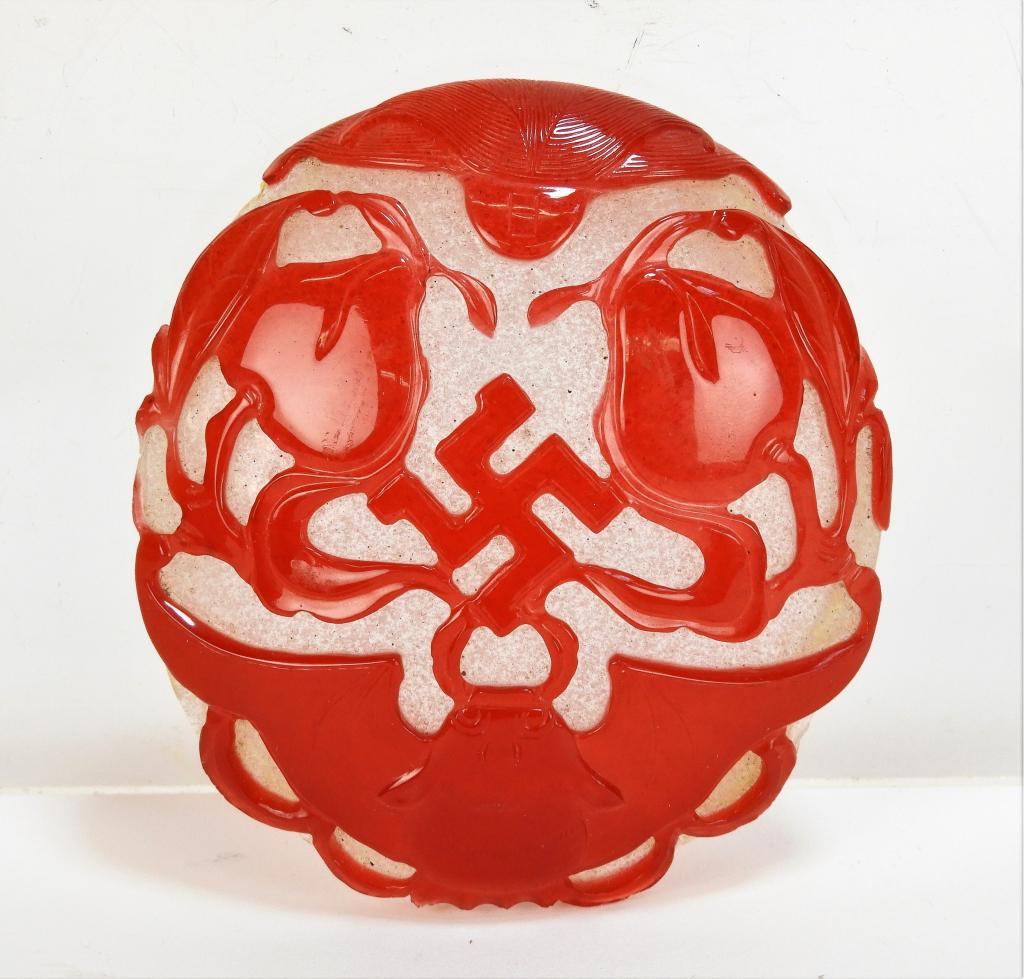 Chinese Bat and Peach Peking Glass Belt Plaque: China 19-20th Century Vibrant red bat over two peaches over white snow glass. 3 1/2" dia.,,Glass ,From the collection of a Bristol, Rhode Island gentleman.