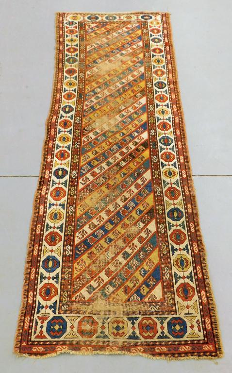 Antique Persian Geometric Carpet Runner: Middle East 20th Century Geometric repeating blue, orange, and cream checker pattern surrounded by geometric boarders. 10' x 37",,Wool ,From the collection of a Providence, Rhode Island gentleman.