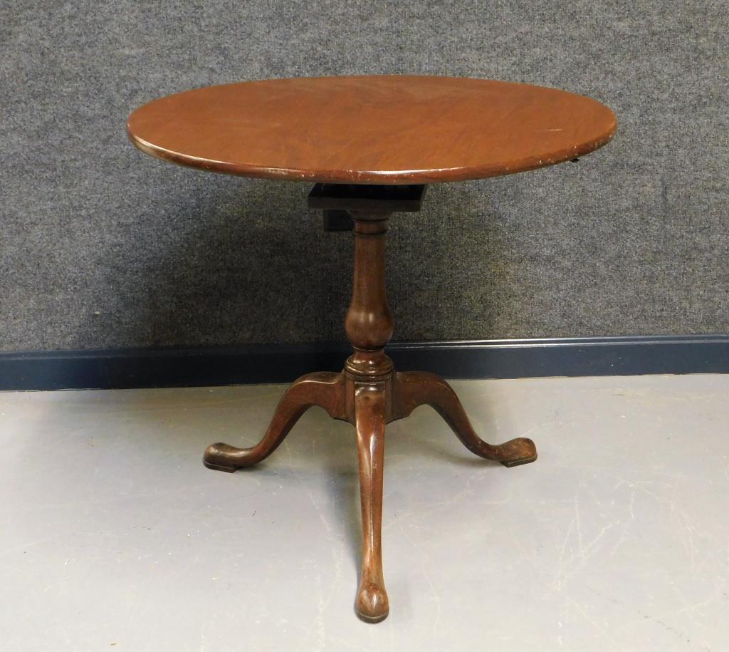 18C Mahogany Tilt Top Birdcage Table: ,United States,18th Century Round tilt top over finely turned column supported by four cabriole legs and Queen Anne feet. Mahogany,27 1/2" x 30" dia., From the collection of a Warwick, Rhode Island ge
