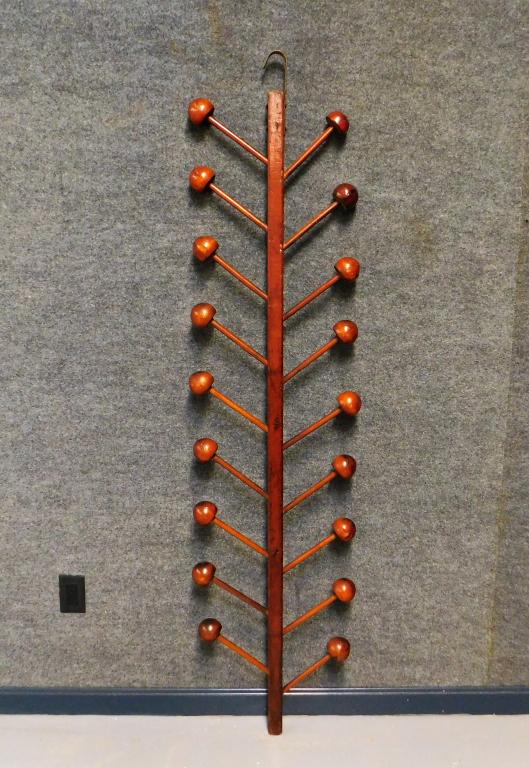 Unusual MCM Floating Hanging Coat Rack: ,Unknown,20th Century Eighteen arm coat rack with hook top and ball ends. Wood,75" t x 18" w x 2 1/2" d, . From the collection of a Medfield, Massachusetts gentleman.