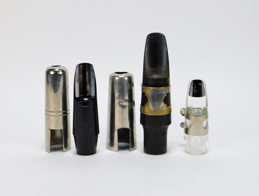 3PC Meyer & Brilhart Saxophone Mouthpiece Group: ,New York,20th Century Includes a Meyer medium chamber 5M mouthpiece, a Brilhart Personaline L6 mouthpiece, and a Brilhart 3 Tonalite mouthpiece. Plastic, metal, rubber,Smallest 3 3/8" x 1 1/8" dia.,L