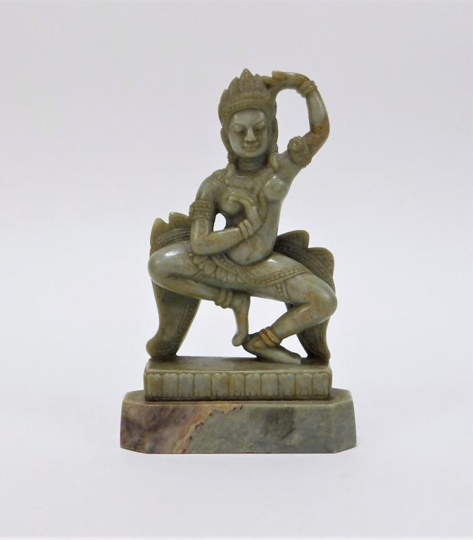 Tibetan Figural Dancer Carved Soapstone Statue: ,Tibet,19th Century A fine high quality carving with smooth finished surface of a bare breasted woman with feathered headdress captured in a dynamic dancing pose. Soapstione,6" t x 3 5/8" w x 1 1/2" d