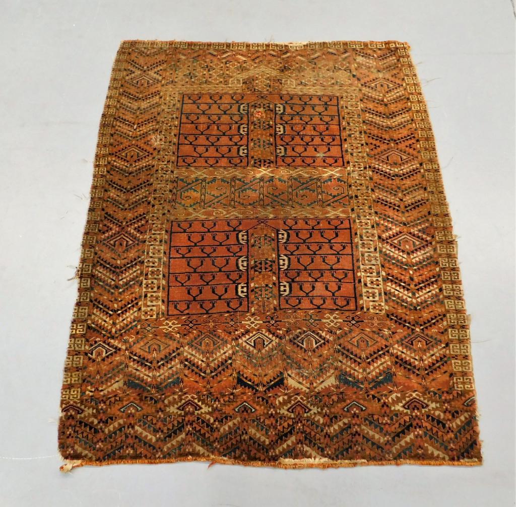 Antique Turkish Geometric Prayer Rug: ,Turkey,20th Century Black geometric pattern over rust field surrounded by ornate geometric boarders. Camel hair,57" x 43", From the collection of a Cambridge, Massachusetts gentleman.