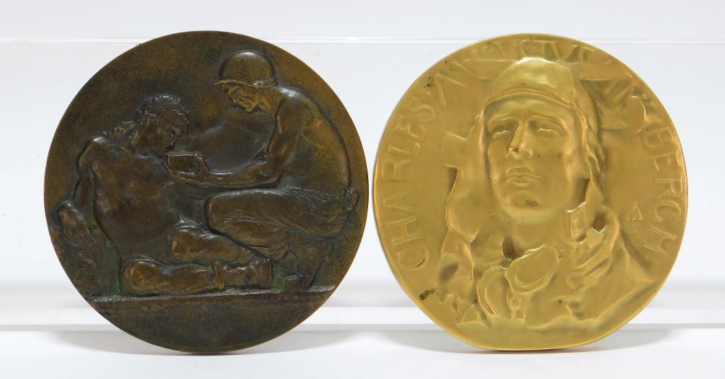 2 Charles Lindbergh World Unity Bronze Medal Group: New York,20th Century Includes a Charles A. Lindbergh medal designed by Frederick William MacMonnies (1863-1937) and a World Unity or Oblivion medal designed by Berthold Nebel (1889-1964). Bronze,2 7/