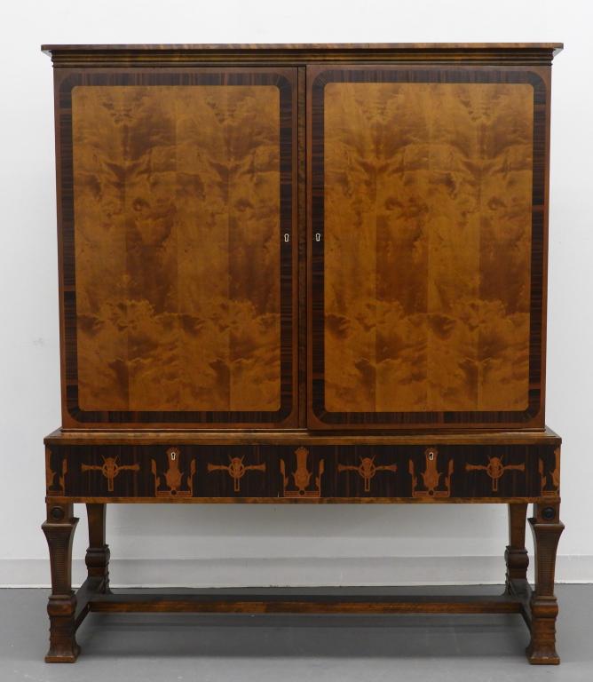 FINE Carl Malmsten Art Deco Dresser Chest on Stand: Sweeden,1888-1972 Finely decorated two door dresser cabinet with bookmatched burl veneer front within banded rosewood veneer over a two drawer stretcher base with stylized foliate inlay over rosewood