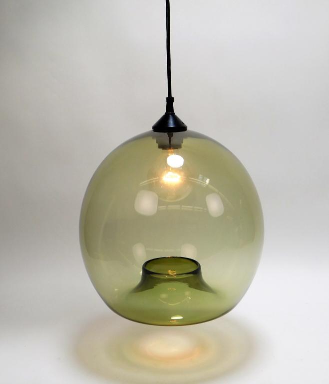 Swedish MCM Glass Orb Ceiling Light: Sweden,20th Century Green glass shade with curled edge housing a single light. Glass, metal,Shade approx. 12 5/8" x 10 3/4" dia..Overall approx. 33 1/2" x 10 3/4" dia. From the collection of a Cransto