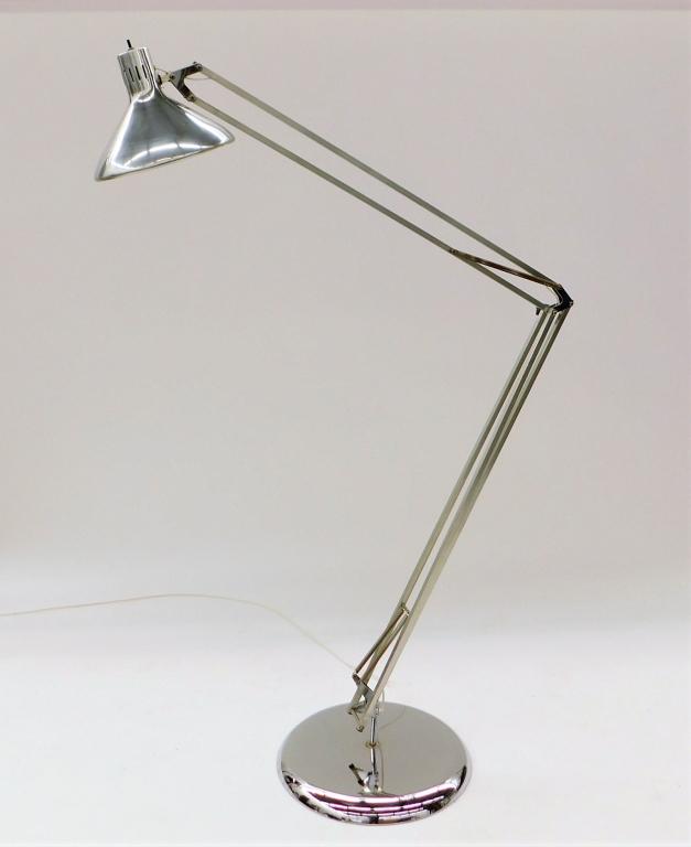 Alsy Grasshopper MCM Adjustable Floor Lamp: United States,20th Century Metal shade supported by adjustable arm and column supported by a simple round base. Arm lengths 40" Shade 10 1/2" dia. Metal,Overall height 81".Base 18" dia. Labeled "Alsy 