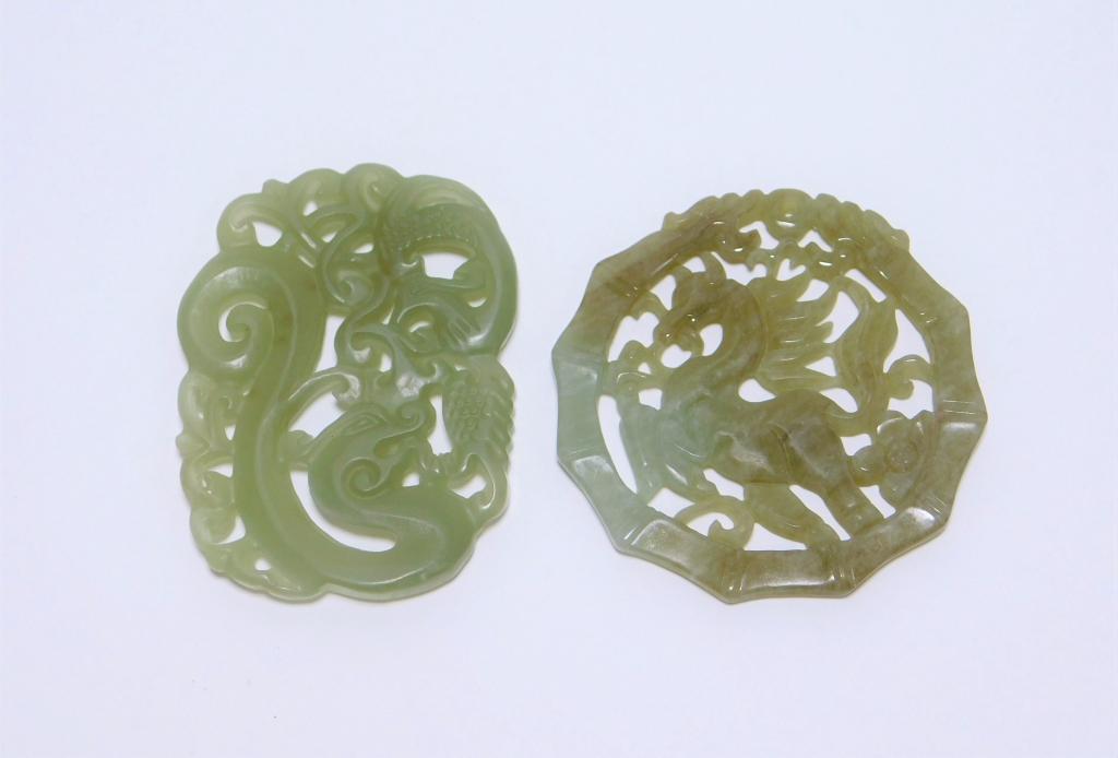 2PC Chinese Qing Dynasty Carved Jadeite Medallions: China,Qing Dynasty Includes a round medallion decorated with a horse surrounded by flowers and an oblong medallion comprised of a dragon. Jadeite,Smallest 1 1/2" x 2".Largest 2" dia. From the collecti