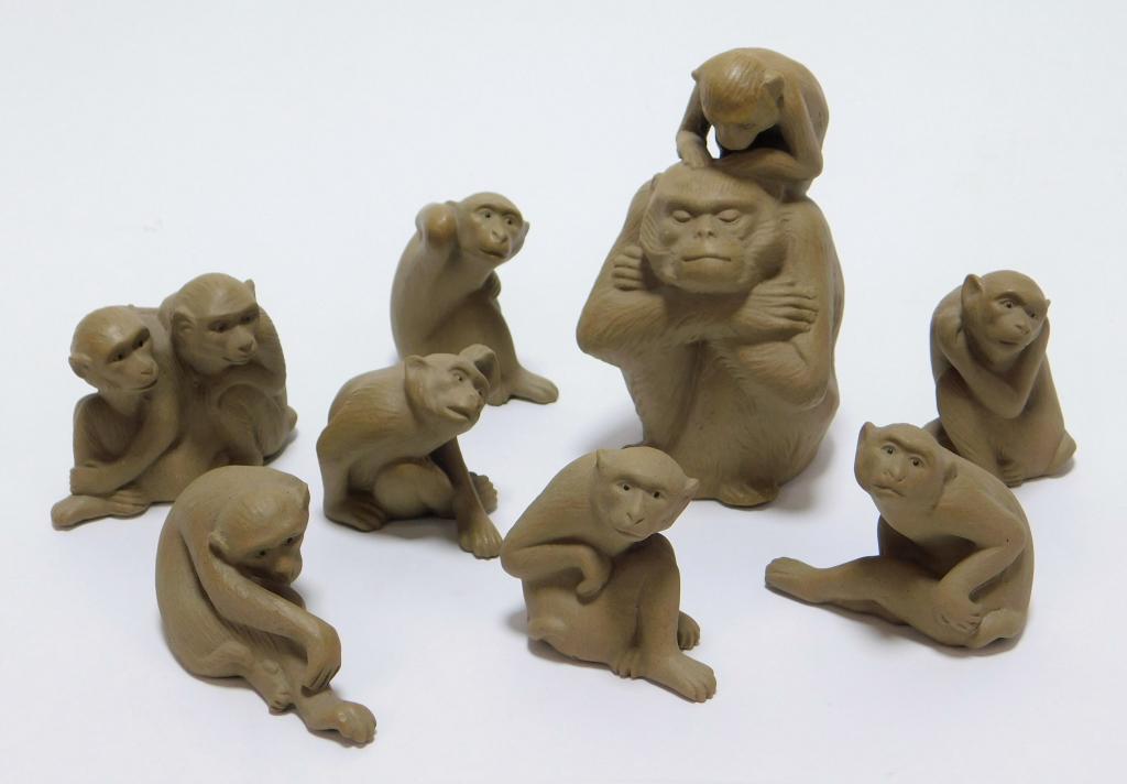 8PC Chinese Yi Xing Pottery Monkey Sculptures: China,20th Century Includes six monkeys in various poses, a figure of a monkey embracing another, and a figure of a large monkey being groomed by a smaller one. Pottery,Smallest 1 3/8" t x 1 1/2" w x 