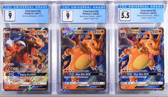 Pokemon Black Star Burning Shadows Charizard Group: United States,2017-2019 Group includes 2016 Pokemon Burning Shadows Charizard GX 20/147 CGC 9 Mint and two 2019 Black Star Promos Hidden Fates Tins Charizard GX SM211, one CGC 9 Mint the other CGC 5.5