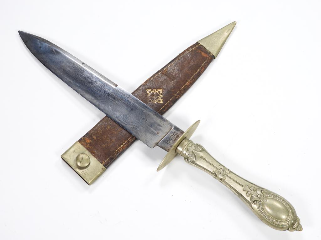 Manson Bowie Knife and Sheath: England,C. 1840s-50s German silver table cutlery-style grip and guard, marked on the ricasso "MANSON/SHEFFIELD," blade etched with foliate designs and "THE GOLD SEEKERS COMPANION," Morocco sheath with