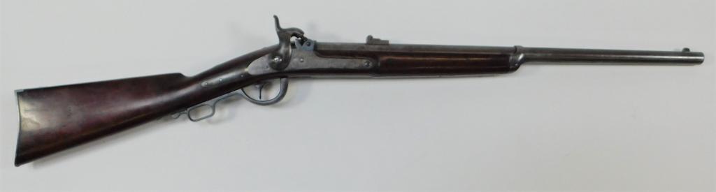 Gibbs Carbine: United States,C. 1863 .52 caliber, serial number 84, walnut stock with "WILL. B" lightly carved into the left side of the butt and light cartouche marks, steel butt plate marked "U.S" on the tang, loc